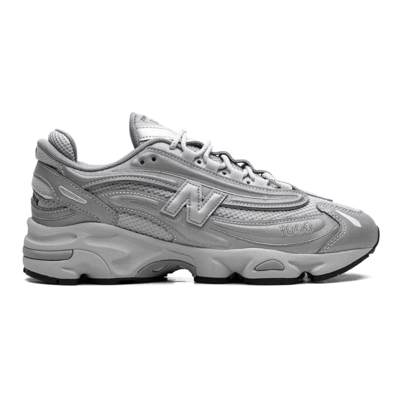 Untitled-design-2025-02-11T181807.821.png New Balance 1000 – Silver Reflective - Image 1