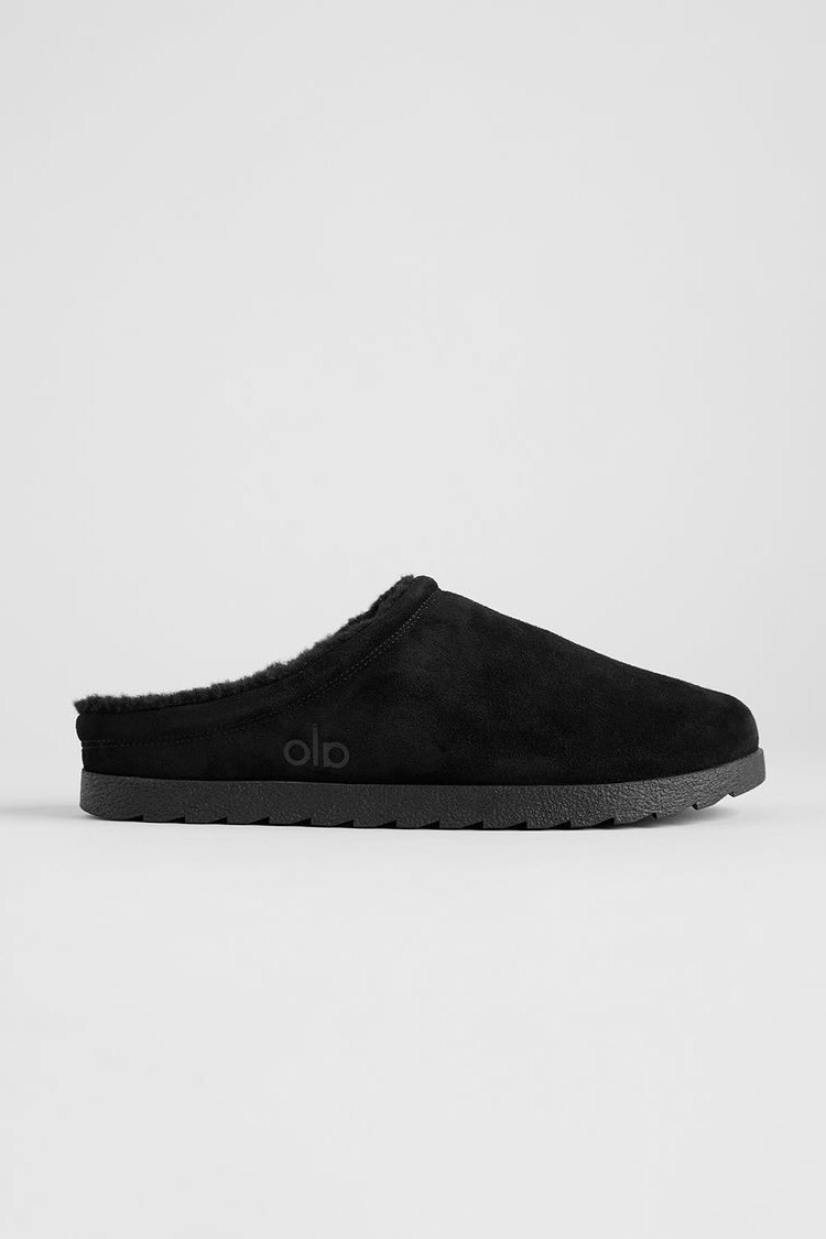 img_2822-1.jpeg Alo Recovery Slipper in the black suede color with a faux fur lining. - Image 1